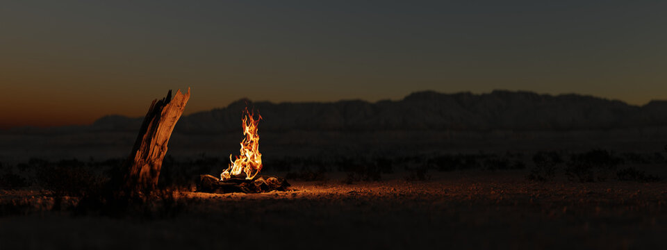 Campfire in the evening in the desert in front of desert mountains