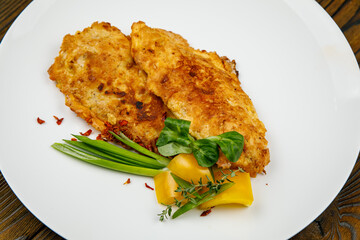 baked meat, grilled chicken on a wooden table
