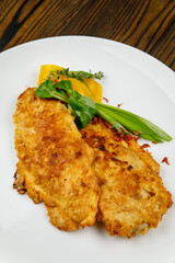 baked meat, grilled chicken on a wooden table
