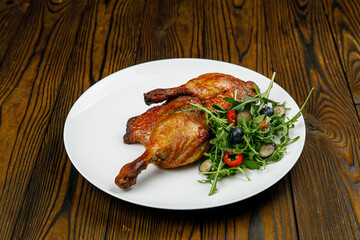 baked meat, grilled chicken on a wooden table
