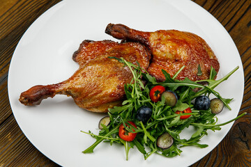 baked meat, grilled chicken on a wooden table
