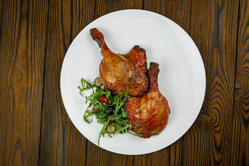 baked meat, grilled chicken on a wooden table
