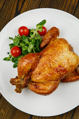 baked meat, grilled chicken on a wooden table
