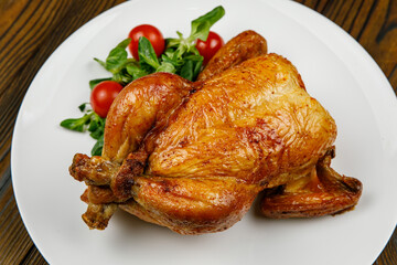 baked meat, grilled chicken on a wooden table
