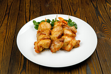 baked meat, barbecue on a wooden table
