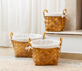 3 wicker baskets in a living room setting