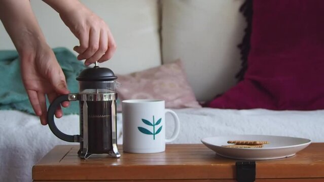 Close Up Of Woman Serving Coffee From A French Press, An Eco Friendly, Zero Waste Way To Make Espresso For A Break At Home