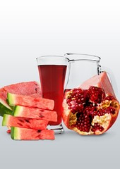 Tasty sweet red drink with ingredients watermelon and pomegranate