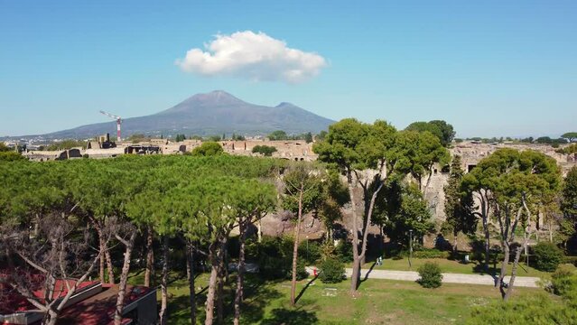 Pompei, Itay: Aerial drone footage of the famous Pompeii archaeological old city by the Vesuve volcano in Napoly, or Naples, in Italy on a sunny day. 