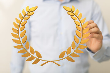 winner honer prize in hand