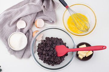 Preparation Mixing Melted Chocolate and Cocoa Powder in Bowl to Make Dough for Delicious Brownie Cake