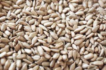 Organic sunflower seeds on table, closeup view