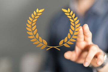 winner honer prize in hand