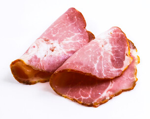 Sliced pork ham on a white background. Shallow depth of field