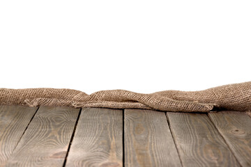 Burlap hessian or sacking on white wooden background