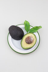 avocado with bone cut on a white background