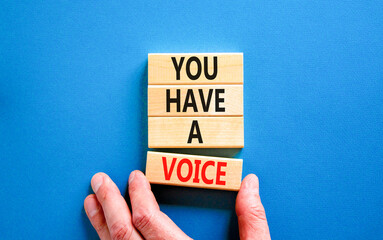 You have a voice symbol. Concept words You have a voice on wooden blocks. Beautiful blue table blue...