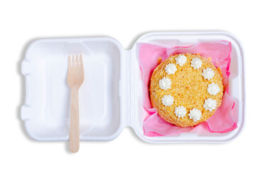 Small bento cake in box on white background isolation, top view