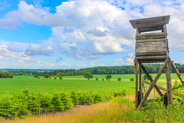 Watchtower shooting range in the forest by the field Germany. - obrazy, fototapety, plakaty