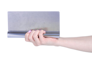 pastry stainless spatula in hand on white background isolation