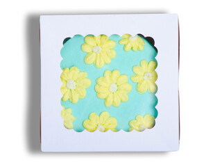 Small bento cake in box on white background isolation, top view