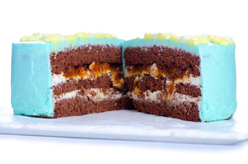 Chocolate сake in a section with nuts on white background isolation