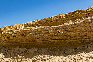 desert landscape, layered sandstone rock