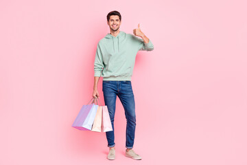 Full length photo of cheerful client wear stylish outfit thumb up satisfied quality low price...