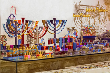 Hanukkah menorahs (traditional candelabra) in antique shop . Bazaar market inJ. Israel colorful  menorahat  Hanukkah' in street in israel  Jewish holiday Hanukkah 