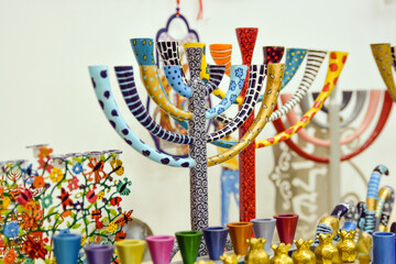 Hanukkah menorahs (traditional candelabra) in antique shop . Bazaar market inJ. Israel colorful  menorahat  Hanukkah' in street in israel  Jewish holiday Hanukkah 