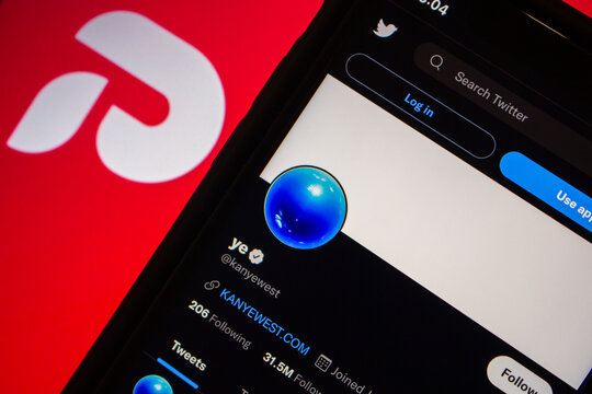 Vancouver, CANADA - Oct 18 2022 : Twitter Account Of Ye (formerly Known As Kanye West) On An IPhone On Free Speech Social Media App Parler Logo Background. Parler Announced That Ye Acquires The Parler