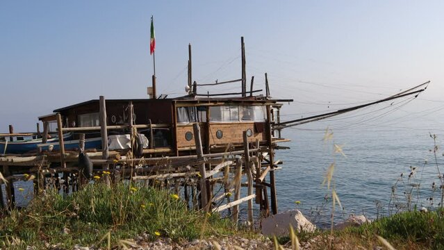 Coast of the Trabocchi, Trabocco in Marina di San Vito Chietino. The Trabocco is a traditional wooden fishing house on pilework, typical of Adriatic sea, coast of Abruzzo, Italy