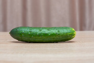 Fresh cucumbers on a wooden table