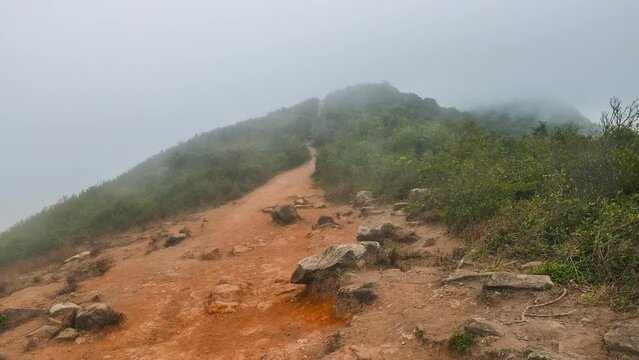 Timelapse of HongKong Dragons Back trail with moving people hiking - Nature moving fog backgrouds