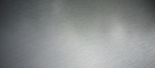 Photo of a chrome-plated silver metal surface. Silver background.