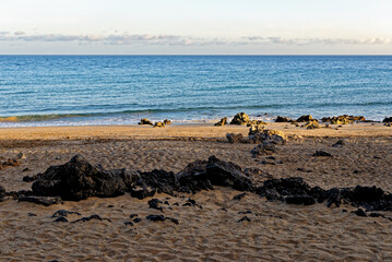 Fototapeta na wymiar Beach of Puerto del Carmen in Lanzarote