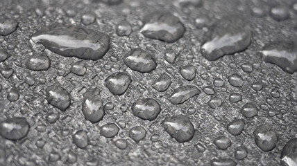 drops of water on a metal surface