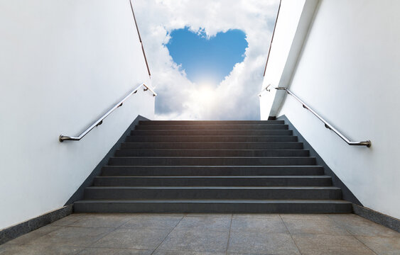Empty staircase leading to heart shape sky