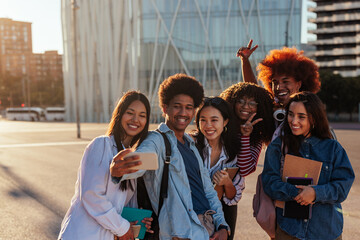 Students take selfie outdoors.