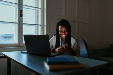 Fototapeta premium Overworked businesswoman working late in the office
