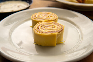 Italian pasta rondelli with ham and cheese