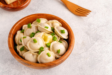 Homemade meat dumplings - russian pelmeni.