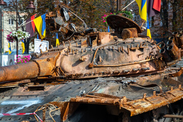 Fototapeta premium Destroyed military equipment of Russia in the war with Ukraine. Burnt Russian tank.