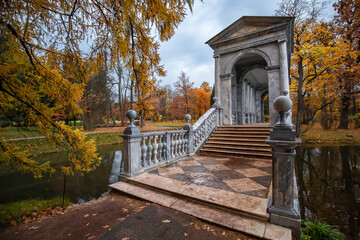 Marble bridge in the autumn park in the city of Pushkin near St. Petersburg