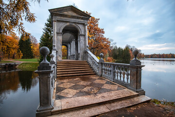 Marble bridge in the autumn park in the city of Pushkin near St. Petersburg