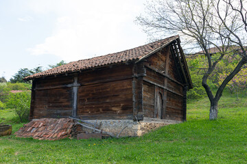 Traditional Georgian wooden farm building in Tbilisi Open Air Museum of Ethnography. Georgia country