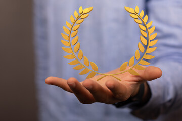 winner honer prize in hand