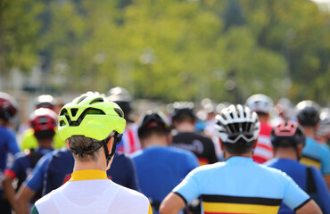 cyclist with helmet of protection and other cyclists before the cycling race