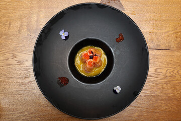 Seafood dinner with a stylishly designed plate design