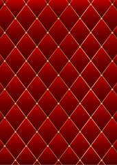 Luxurious background of red leather, upholstery with gold buttons